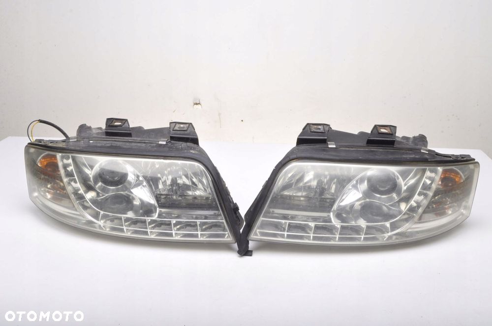 AUDI A6 C5 LAMPY PRZÓD KOMPLET EUROPA ZAMIENNIKI SK3401-ADA699 SONAR - 1