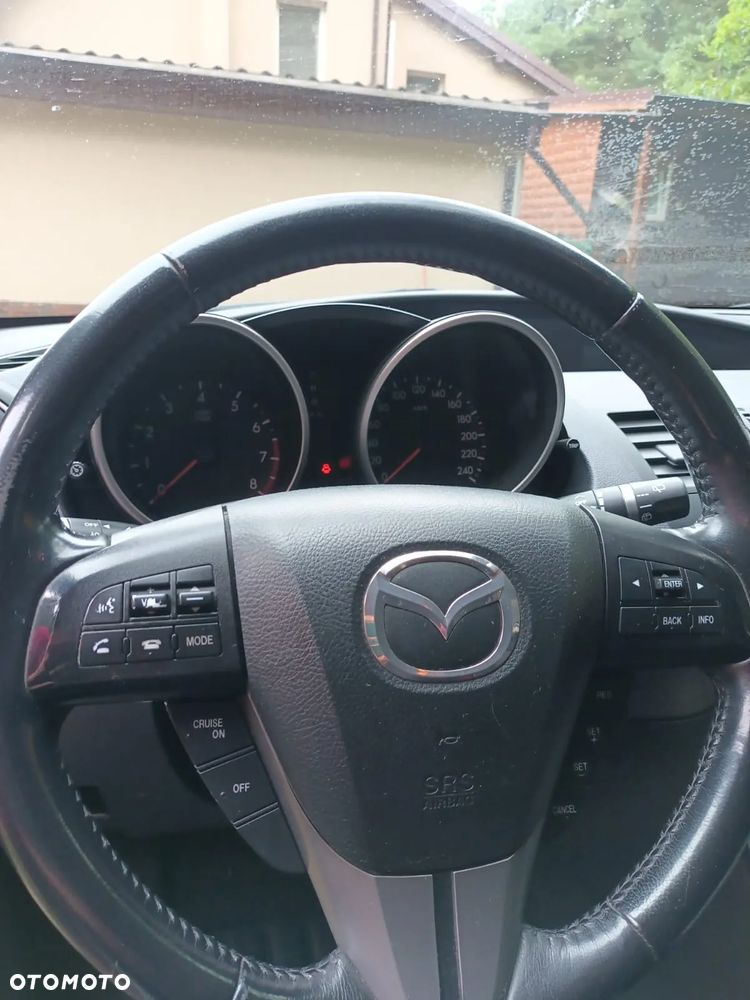 Mazda 3 2.0 Exclusive + - 14