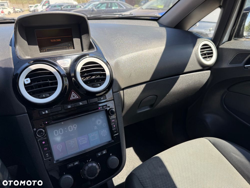 Opel Corsa 1.4 16V Cosmo - 13
