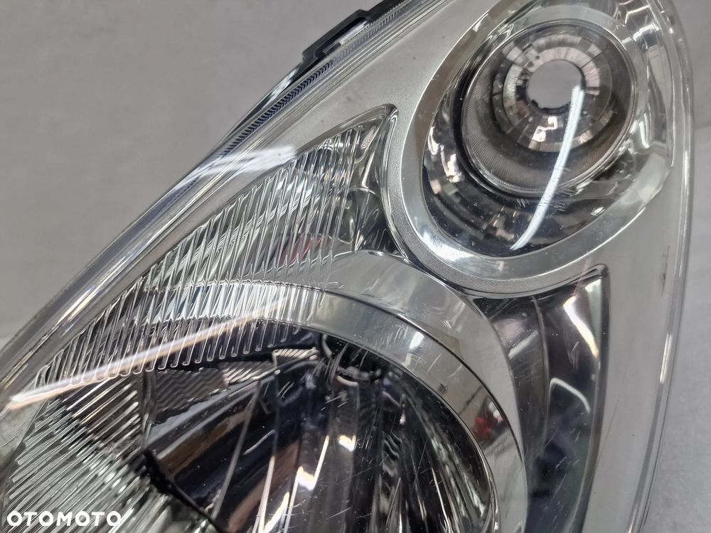 SUZUKI SPLASH LIFT 11- LEWA LAMPA PRZEDNIA PRZÓD , NR 35300-51K20 / 90030690 , NR AUKCJI LPP49 - 7