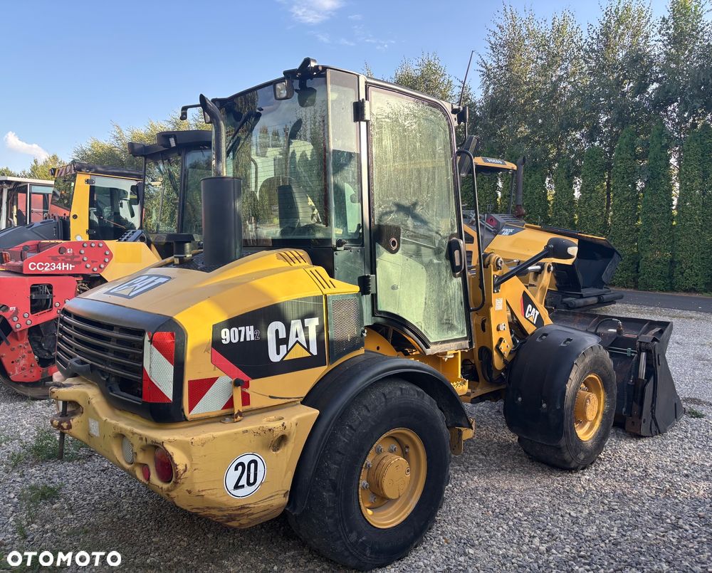 Caterpillar 907H2 rok 2013 4x4 szczeka dzielona - 5