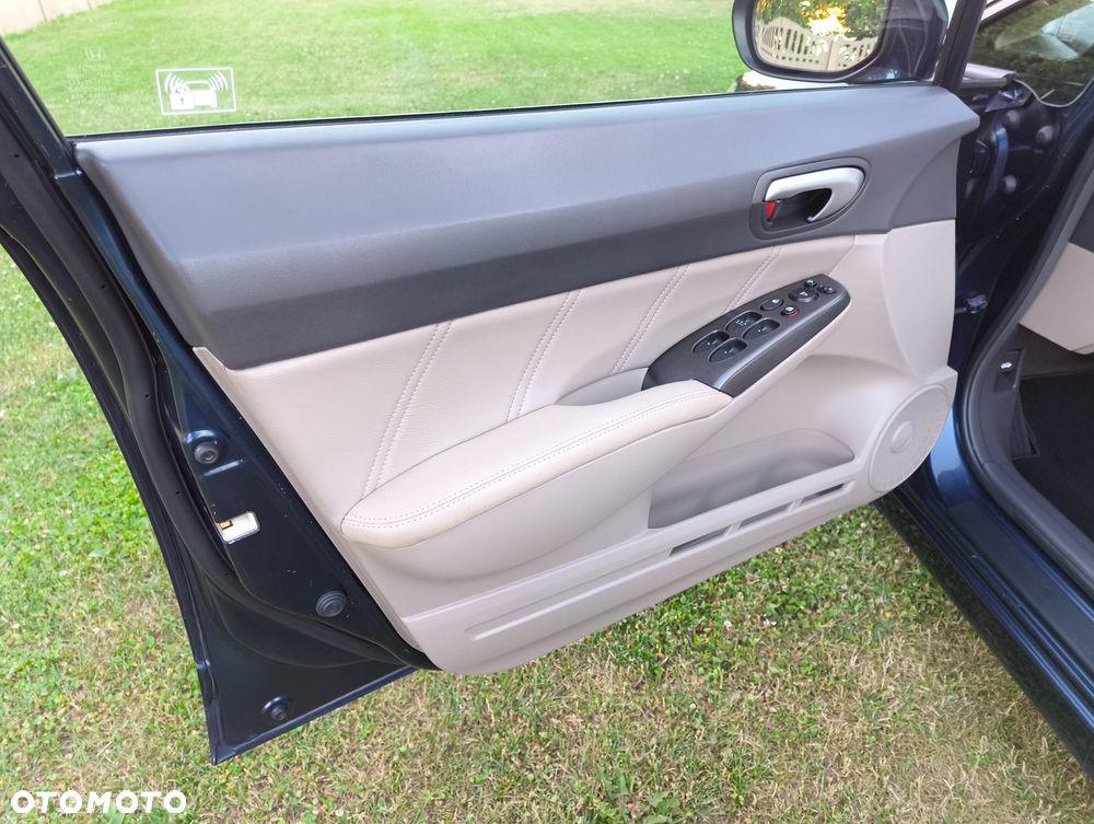 Honda Civic 1.3i-DSI i-VTEC IMA CVT Elegance - 27