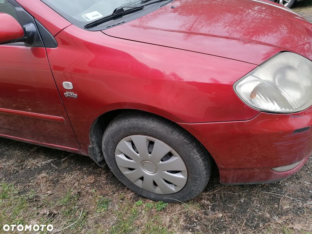 BLOTNIK PRAWY LEWY TOYOTA COROLLA E12 3N8 - 2