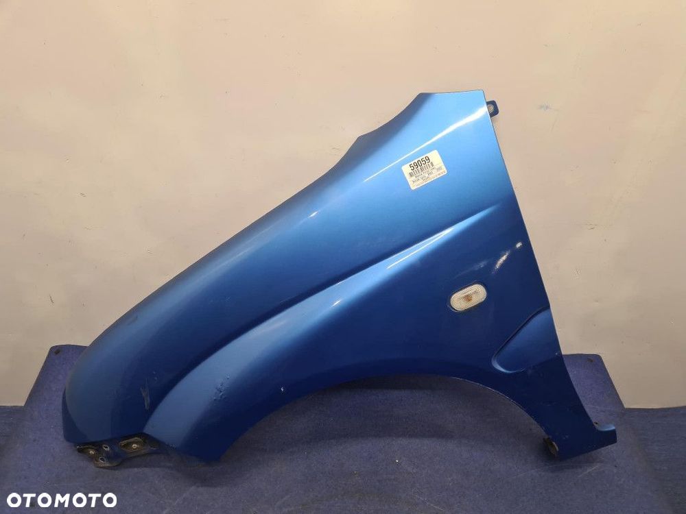 SUZUKI IGNIS BŁOTNIK PRZÓD LEWY  Z7B - 2