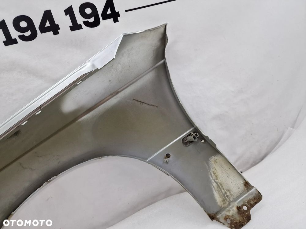 OPEL OMEGA C 99-02 SREBRNY PRAWY BŁOTNIK PRZEDNI PRZÓD , NR AUKCJI BŁ179 - 15