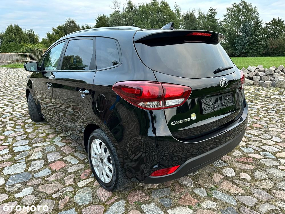 Kia Carens - 4