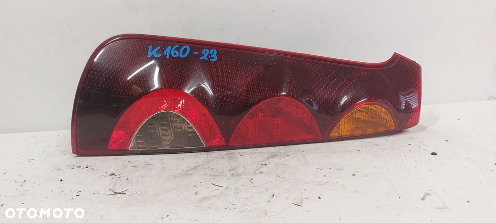 .  TYL TYLNA LAMPA LEWA NISSAN NOTE