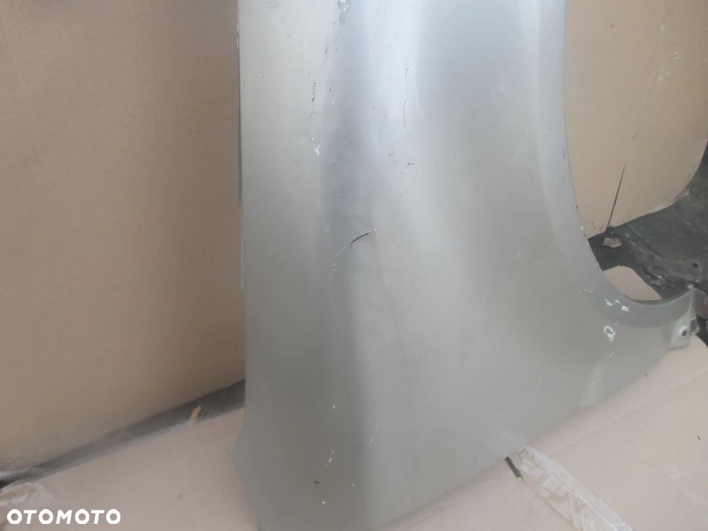 błotnik prawy VW Passat B5 FL Orginał bez rdzy - 5