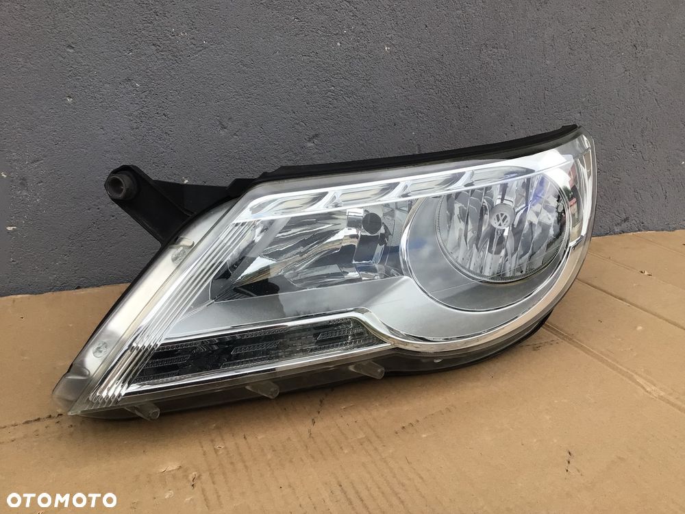 Lampa przednia lewa VW Tiguan l 1 2007+ - 1