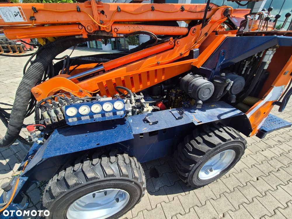 Sandvik Tamrock COMMANDO 120R 4X4 / WIERTNICA DO SKAŁ / SERWISOWANA / 1 WŁ / PEŁNA DOKUMENTACJA / WIELE CZĘŚCI ZAMIENNYCH / ZDALNE STEROWANIE / SILNIK CAT / TRANSPORT / NOWE OPONY - 11