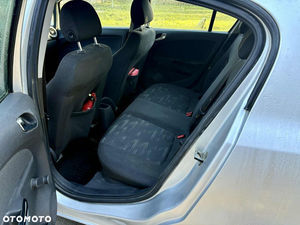 Opel Corsa 1.2 16V Enjoy - 11