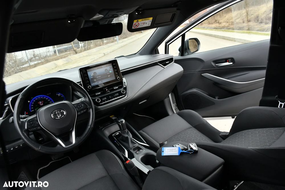 Toyota Corolla 1.8 HSD Exclusive - 29