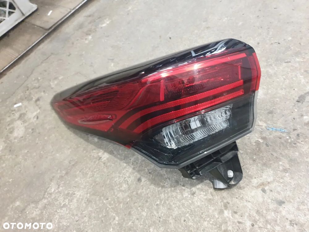 TOYOTA HIGHLANDER 20- lampa tył lewa BDB - 2