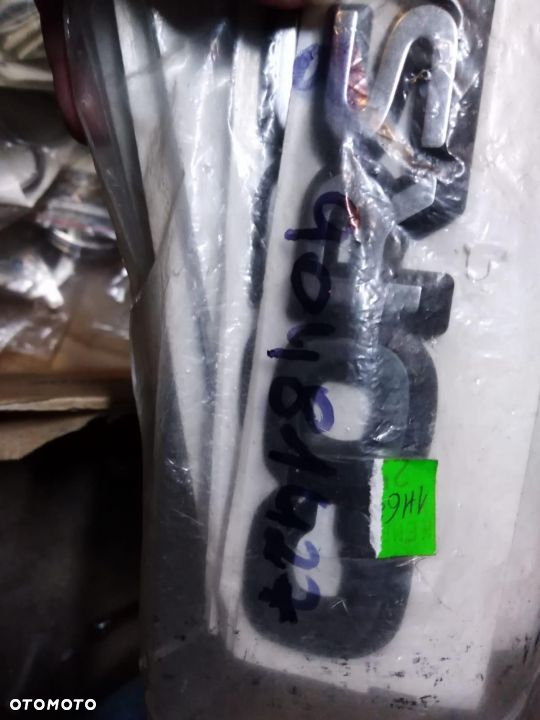 Emblemat Opel  CORSA A 90481427 ORYGINAŁ