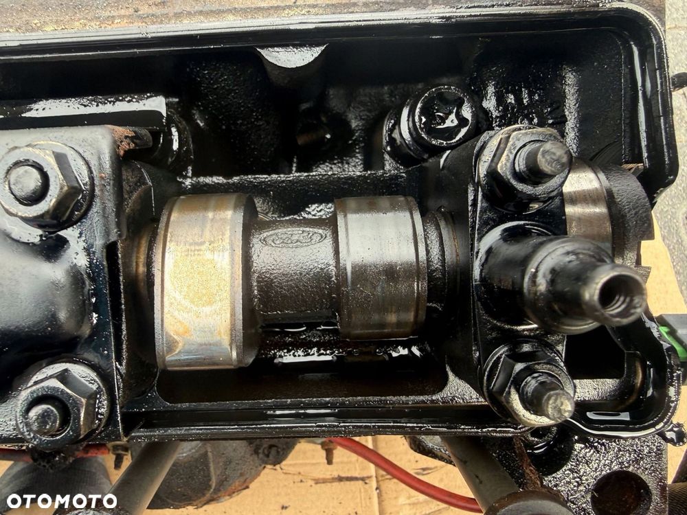 GŁOWICA SILNIKA 1.8 TDCI FORD RM4M5Q6C032AA - 2