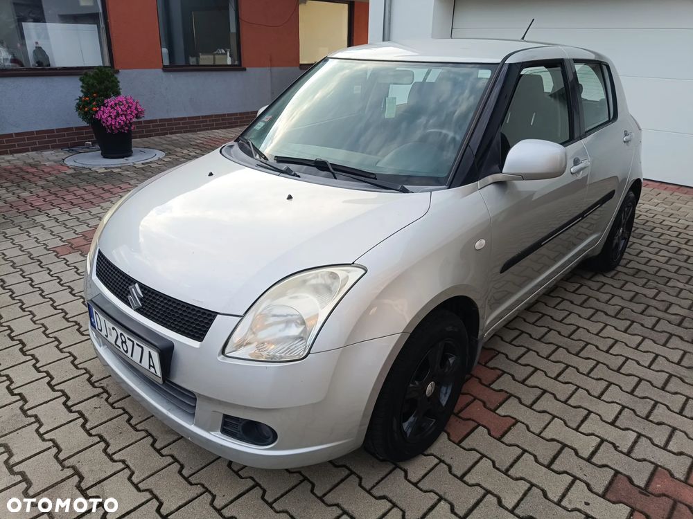 Suzuki Swift 1.3 GS / Premium 4WD - 1