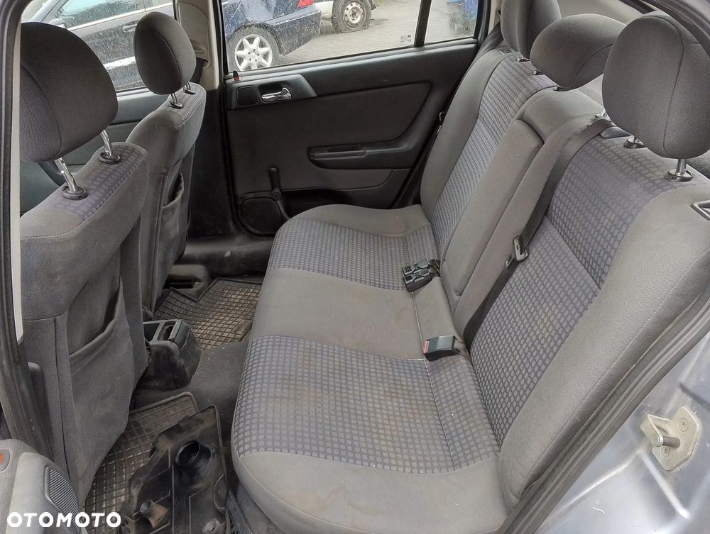 Opel Astra G (03r.) 1.7 CDTI 80KM. Silnik Z17DTL Skrzynia M79/F17 W355  lakier 4AU.Cały na części. GWARANCJA !!!  Przód Tył Zestaw Komplet Drzwi Klapa Zderzak Błotnik Maska Grill Atrapa Szyba Pas Lampa Lusterko Boczki Fotel Kanapa Kokpit Deska Rozdzielcza Przełącznik Włącznik Sterownik Przewody Wiązka Instalacja Moduł Komputer Czujnik Listwa Pompa Alternator Wtryski Głowica Rozrusznik Kompresor Sprzęgło Dwumas Silnik Skrzynia ABS Klimatyzacji Paliwa Wspomagania Kolektor Turbina Przepustnica Zawór Chłodnica Koło Hak Belka Sanki Zawieszenie Mcpherson Półoś Amortyzator Wydech Tłumik Zacisk Most - 9