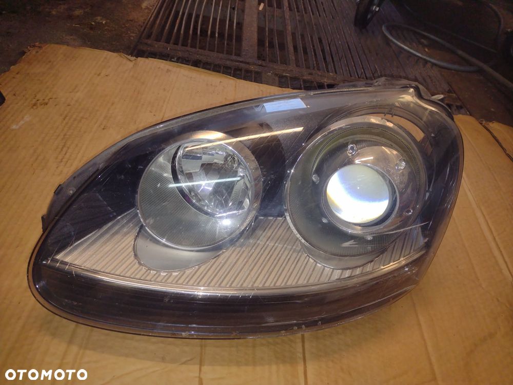 VW GOLF V 06R LAMPA LEWY  BIXENON EUROPA - 1