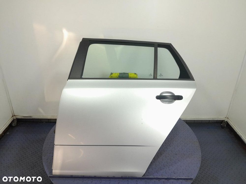 SKODA FABIA II LIFT KOMBI DRZWI TYŁ TYLNE LEWE LA7W - 1