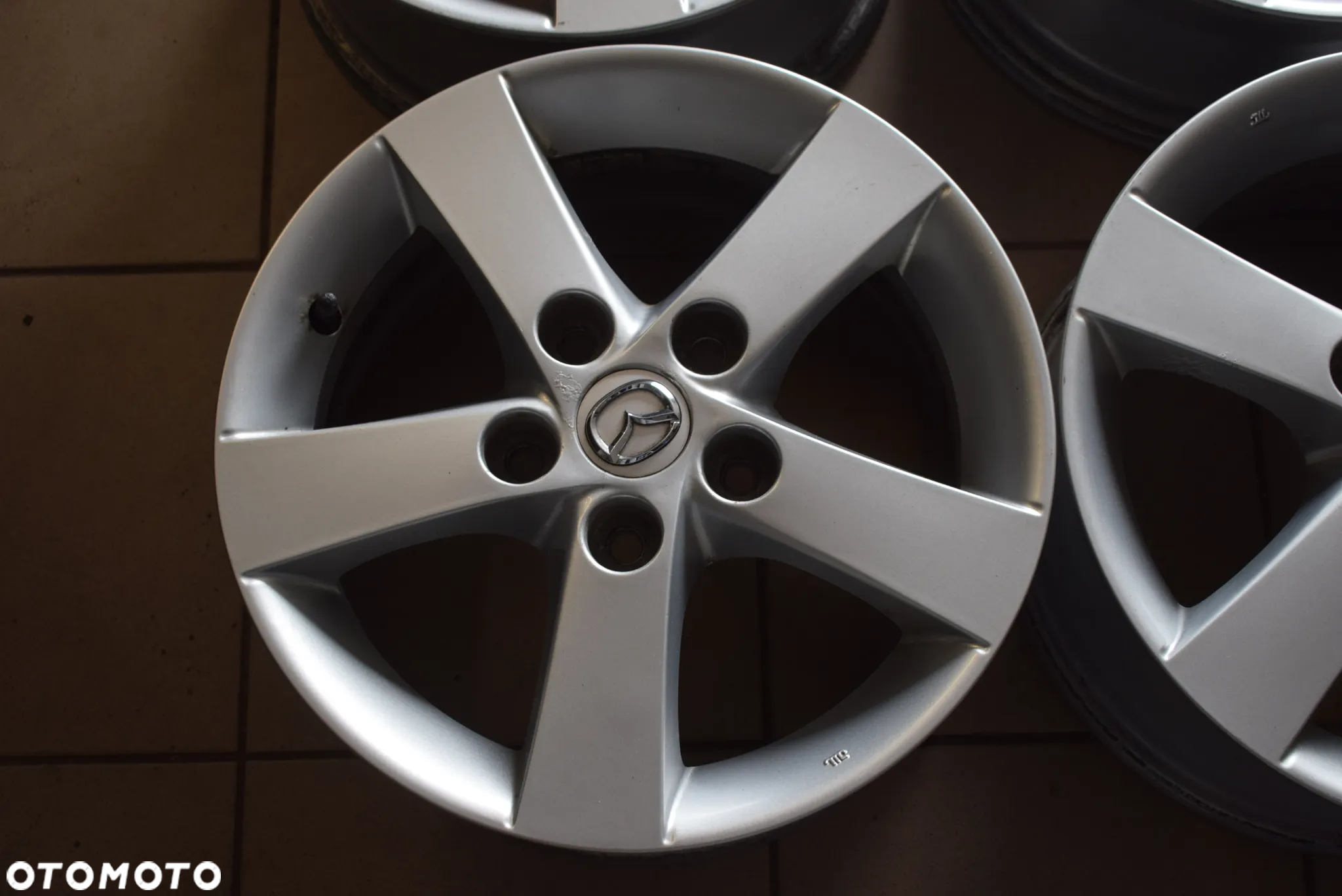Felgi aluminiowe alufelgi Mazda 6Jx15 5x114,3 - 7