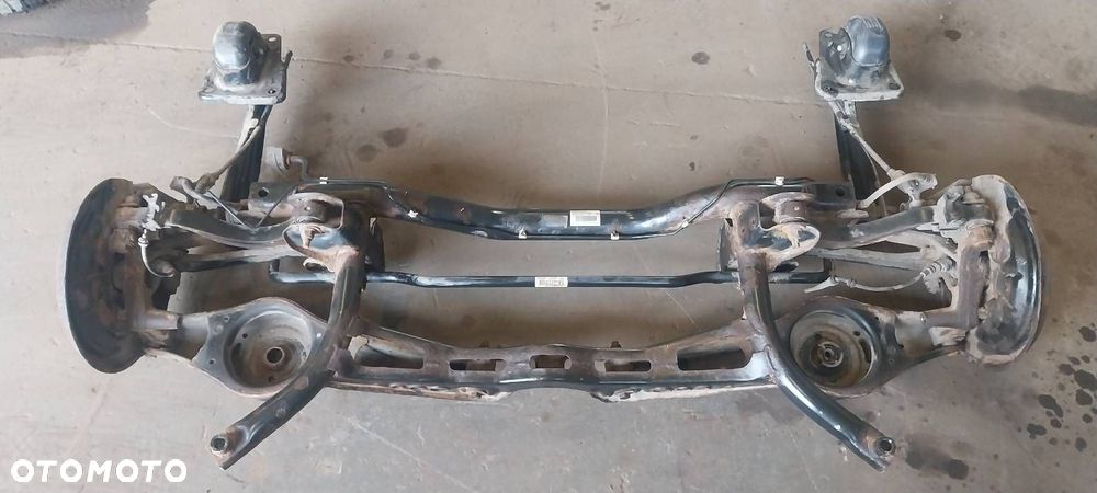 KOMPLETNE ZAWIESZENIE BELKA SANKI TYŁ WAHACZE HAMULCE SKODA OCTAVIA II HB - 1