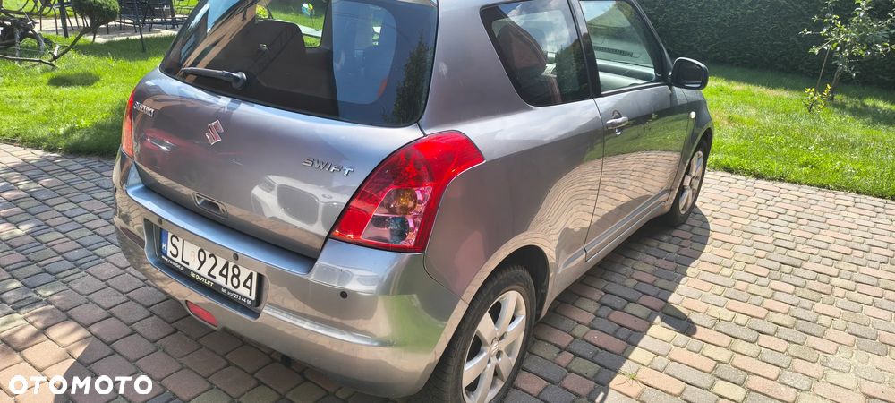Suzuki Swift 1.3 Club - 11