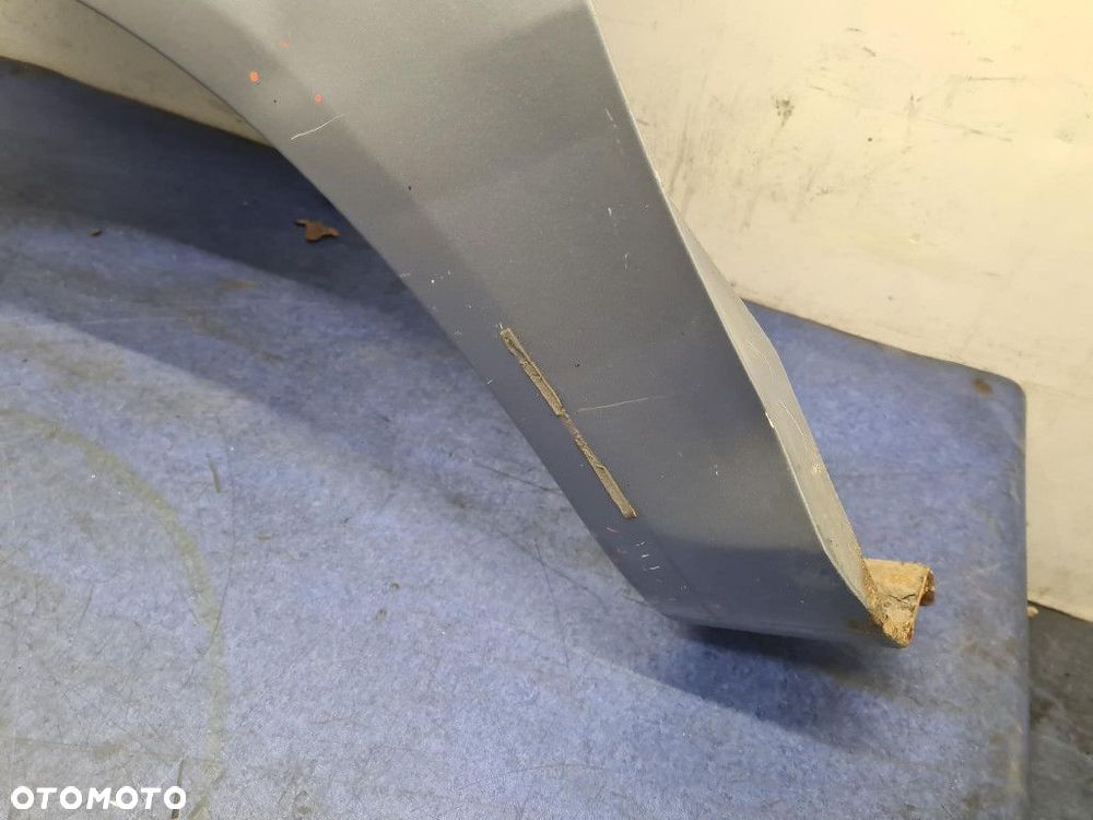 OPEL CORSA D BŁOTNIK PRZÓD LEWY - 4