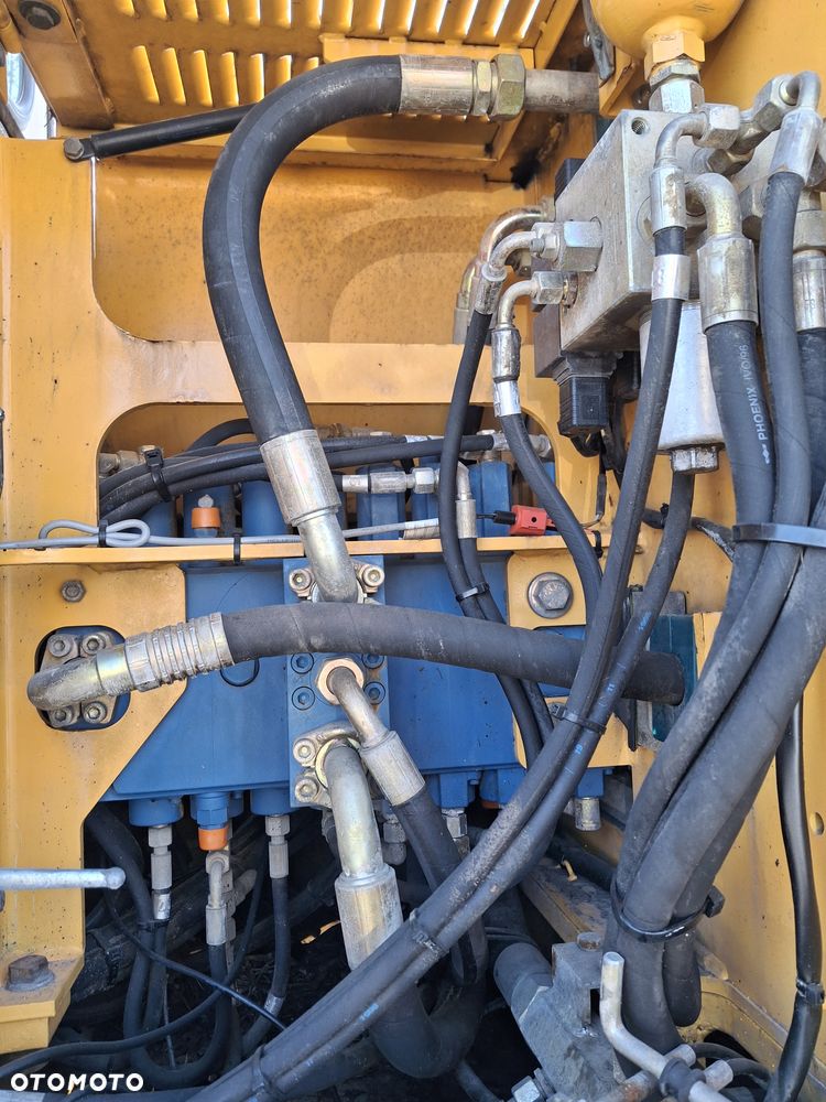 Liebherr A312 CAT JCB - 23