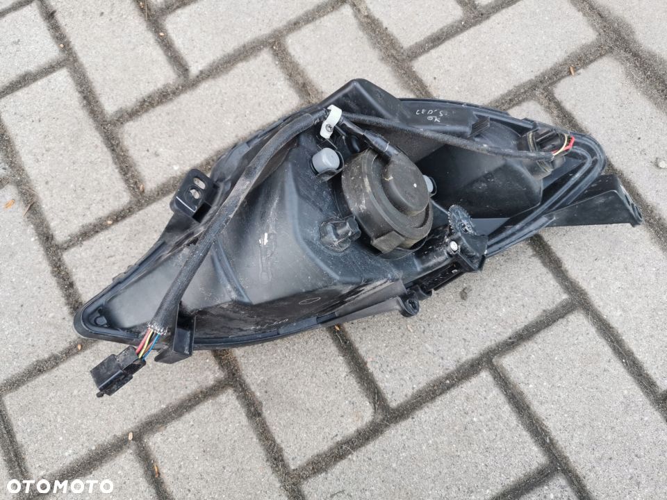 Reflektor LEWY przód Peugeot Satelis 125 14R - 4