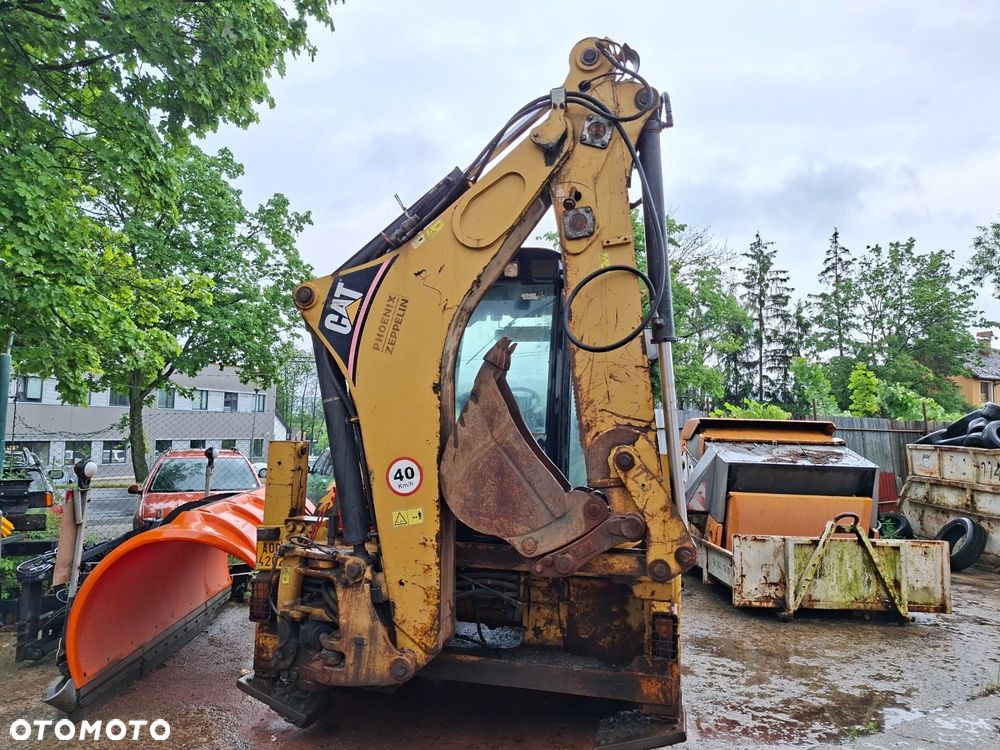 Caterpillar 428 E - 5