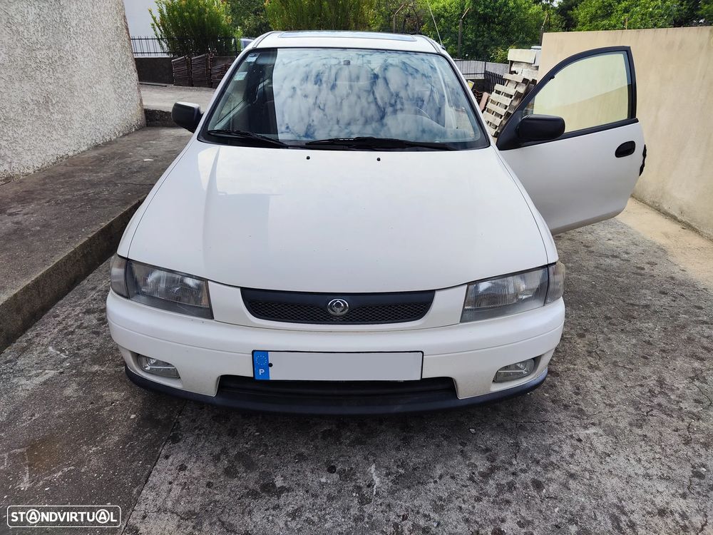 Mazda 323 P 1.3 TA - 4