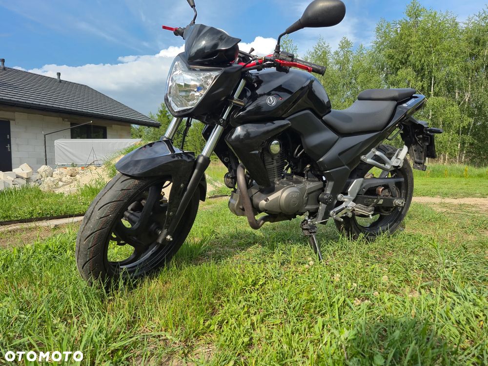 SYM Inny - 10