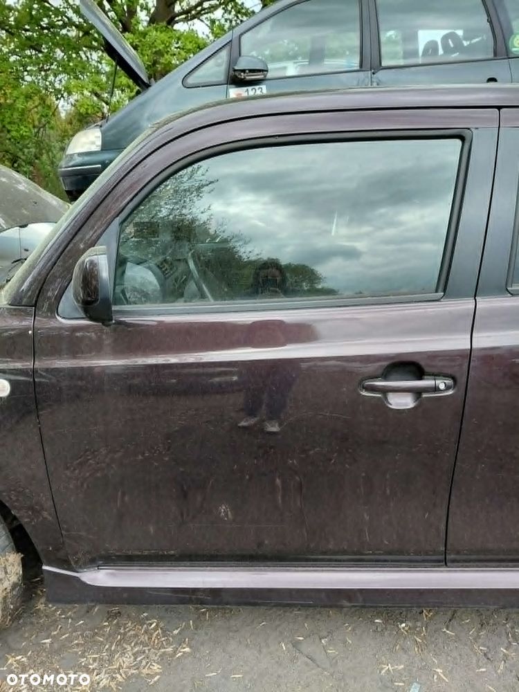 Drzwi przednie lewe prawe drzwi przód Klapa bagażnika Kompletna Daihatsu Materia Rok 2008 Pojemność 1298 Moc 67 kw Benzyna - 1
