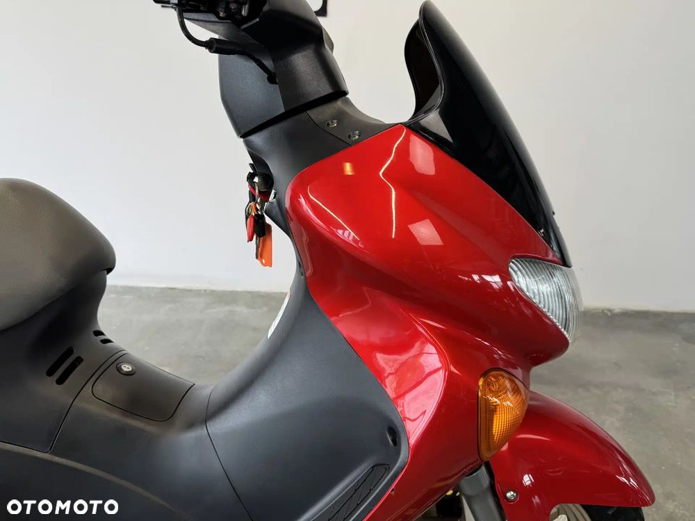 Suzuki Inny - 12