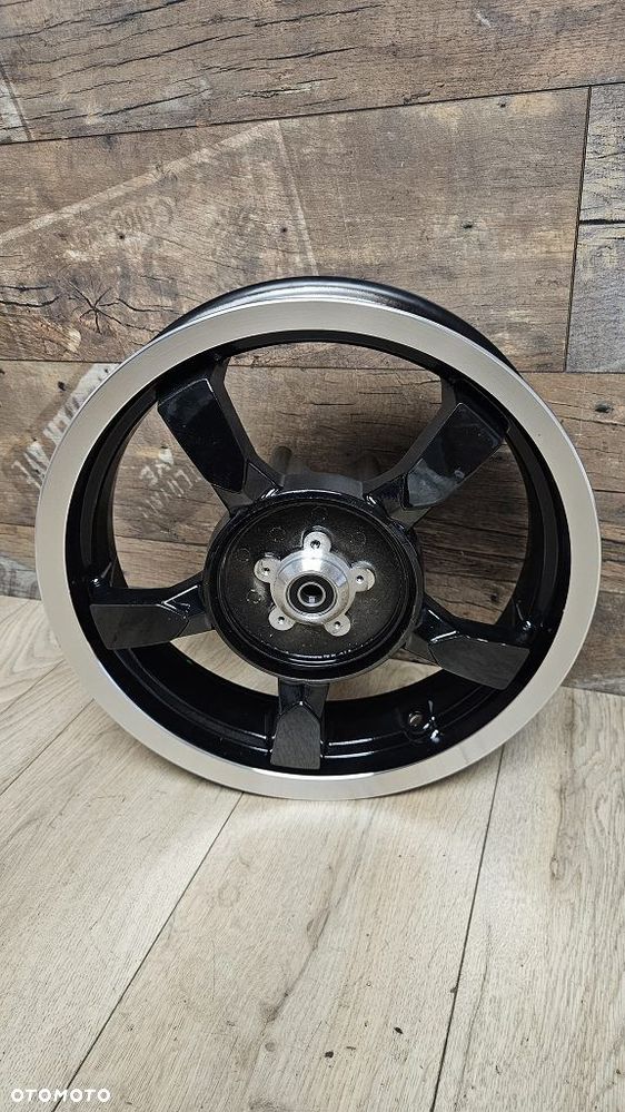 Felga przód 14" Peugeot Satelis 125 (06-09)  766320N - 2