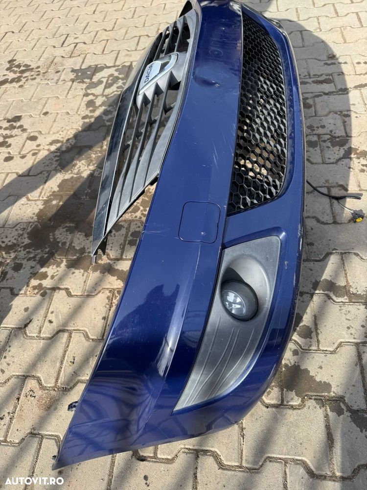 Bara fata cu grila si proiectoare Dacia Logan 2010- 2013 - 2