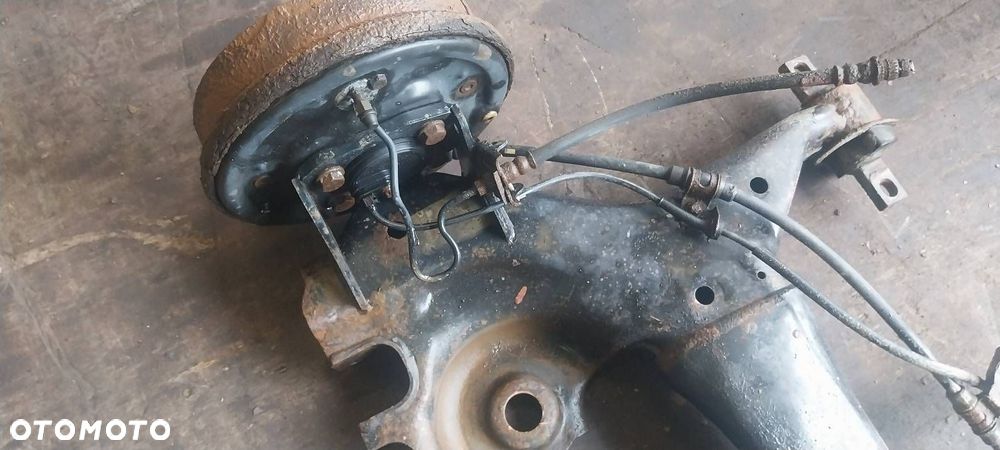 BELKA OŚ ZAWIESZENIA TYŁ BĘBNY Z ABS MITSUBISHI COLT VI HB 5D - 3