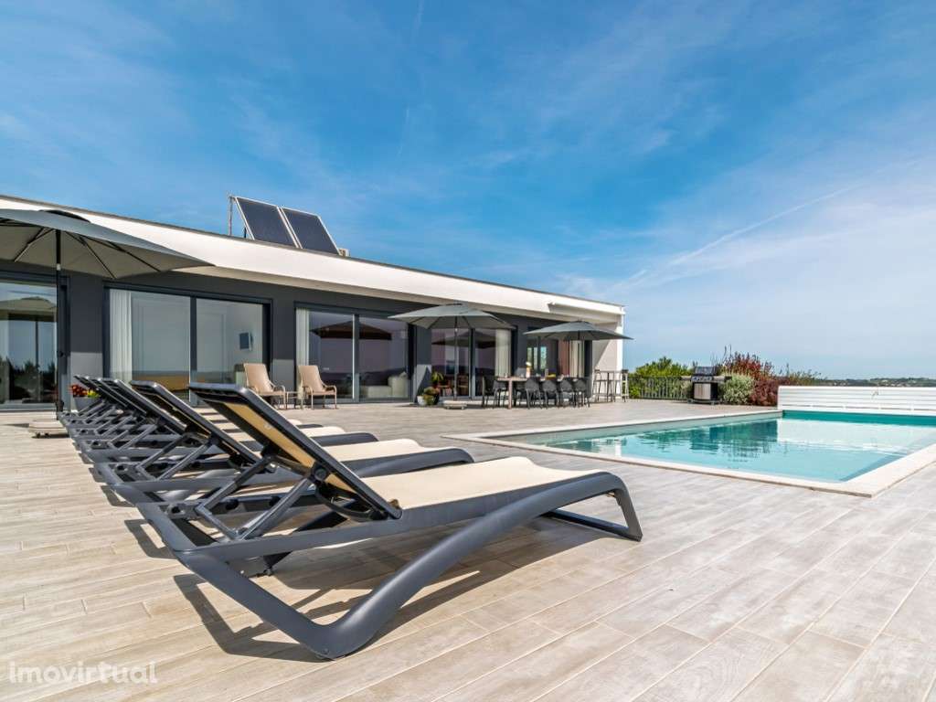 Moradia de luxo rodeada pela natureza inserida em 6920m² de terreno - Grande imagem: 4/60