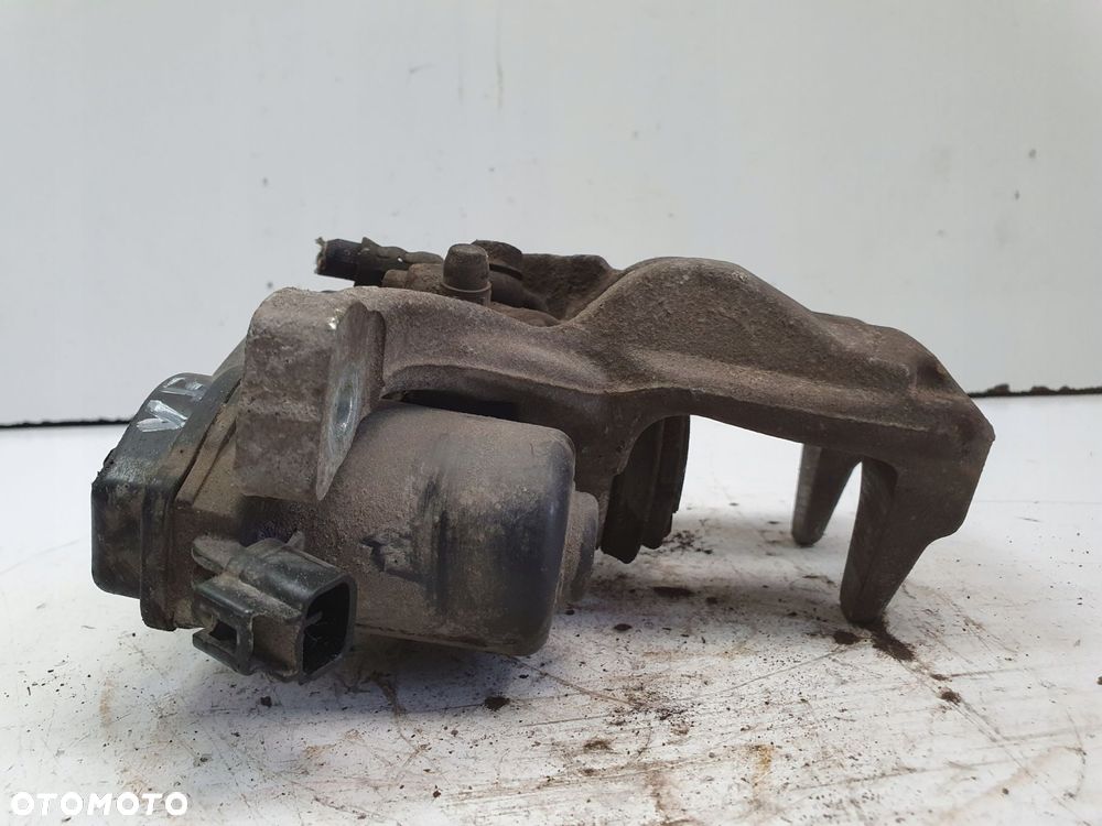 Toyota Corolla XII E21 TYLNY ZACISK HAMULCOWY lewy tył KIEROWCY A006B119B - 6