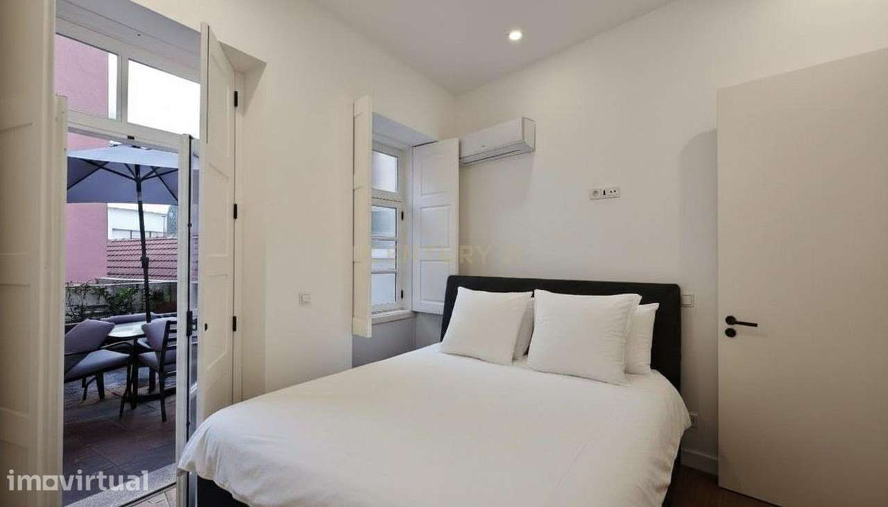 Apartamento T2 com terraço e fachada histórica no centro do Porto - Grande imagem: 4/11