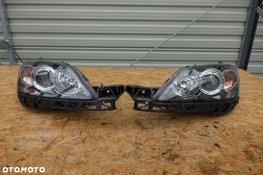 REFLEKTOR 2 LAMPY PRZÓD KPL EUROPA MAZDA 3 03-06 5343534 - 1