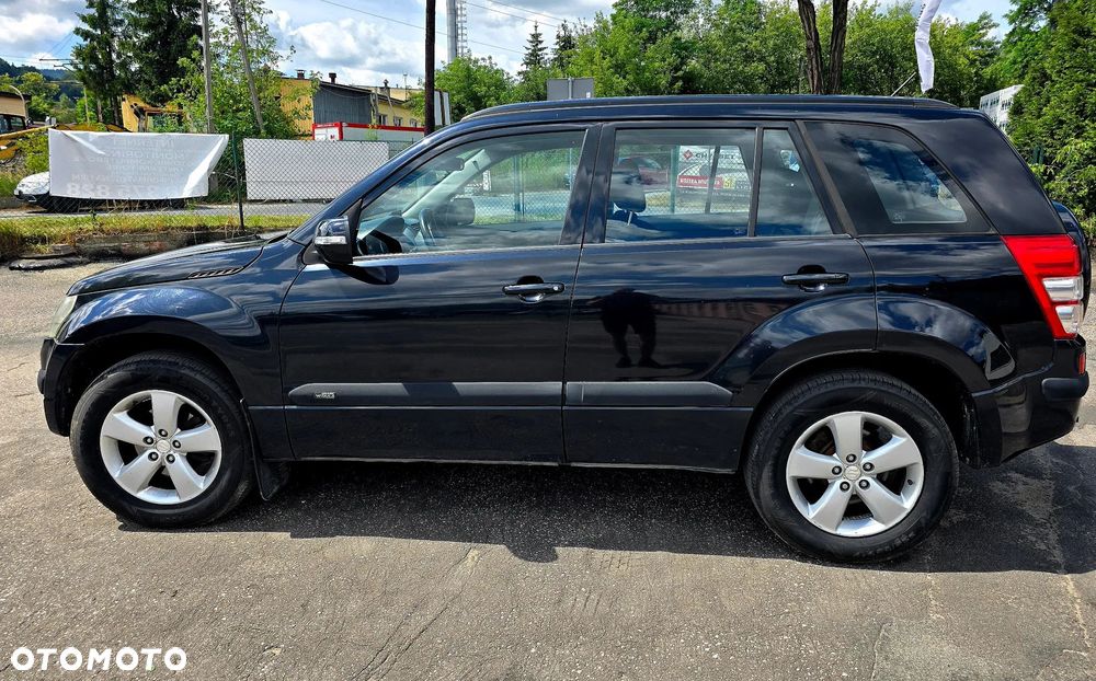 Suzuki Grand Vitara 2.0 - 7