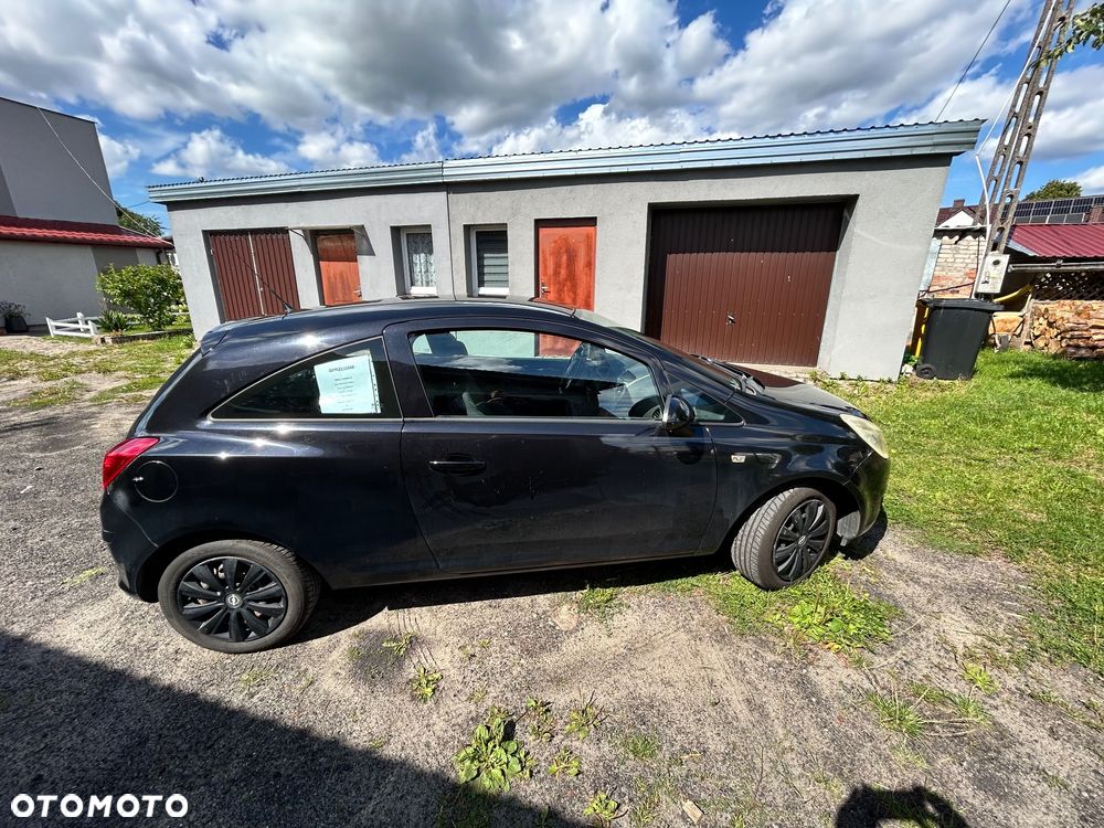 Opel Corsa 1.2 16V Enjoy - 11
