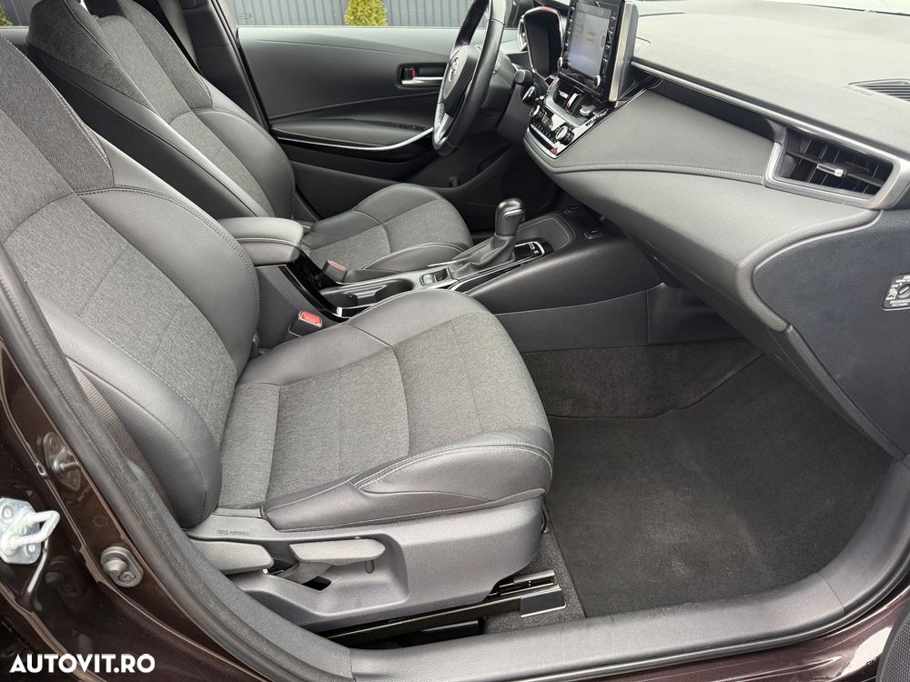 Toyota Corolla 1.8 HSD Exclusive - 19