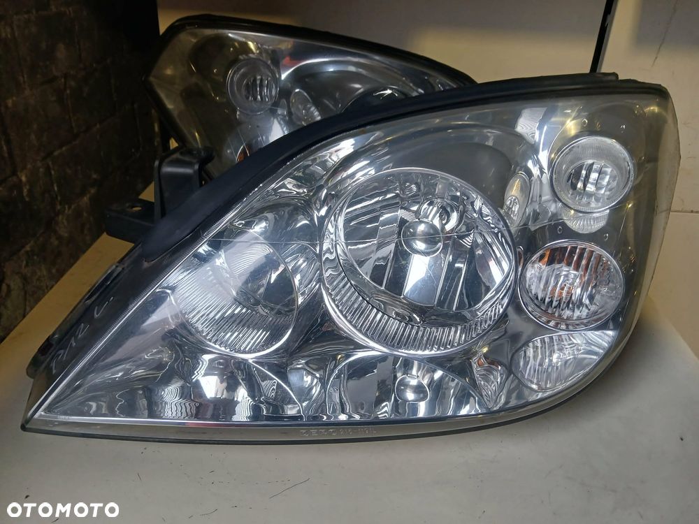 Nissan Primera P12 Lampa przednia lewa - 1