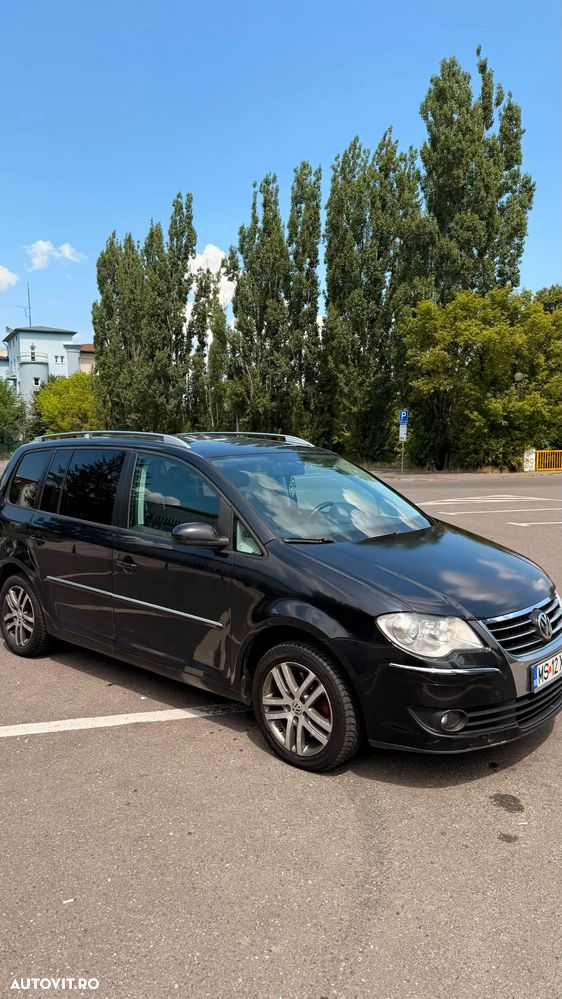 Volkswagen Touran - 11