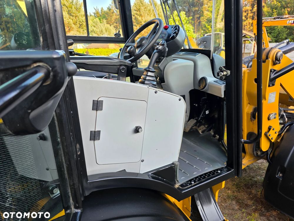 Caterpillar CAT 906 - 23
