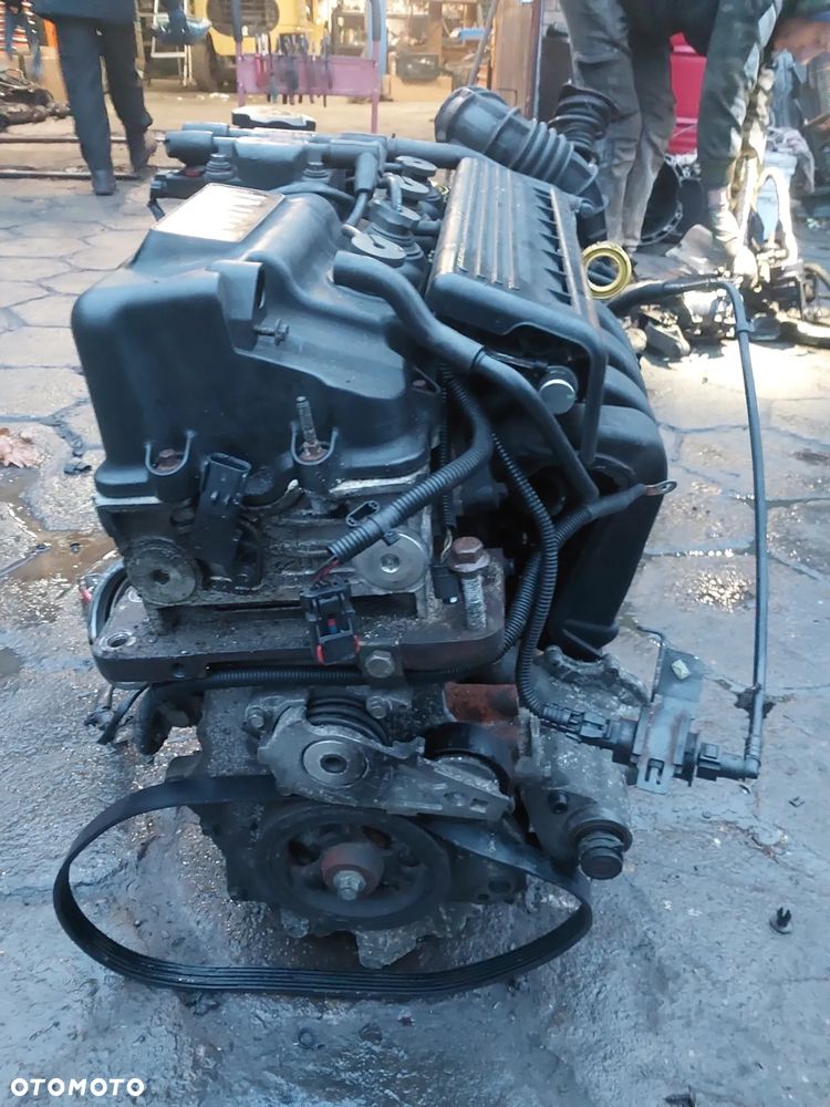 Silnik na części BMW Mini Cooper R50 R51 R52 R53 R55 1.6 16v 116KM VTI WB10B16 Głowica Blok Pokrywa Kolektor Cewka Przepustnica Miska olejowa Czujnik silnika Napinacz Pokrywa zaworów Osłona Sprzęgło 6 Biegów  W10B16D194Q256 - 5