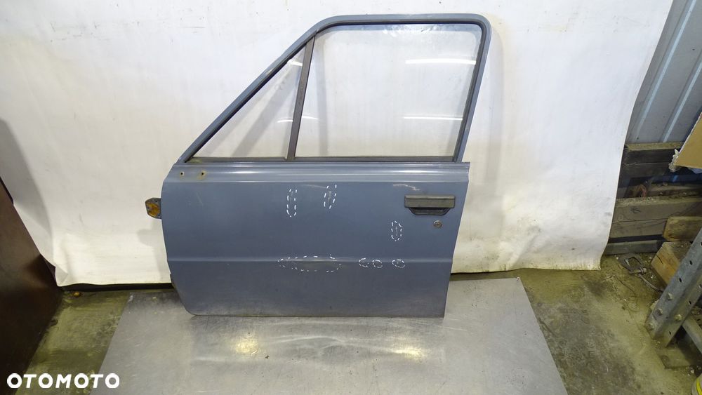 DRZWI LEWY PRZÓD SKODA 105 L - 1