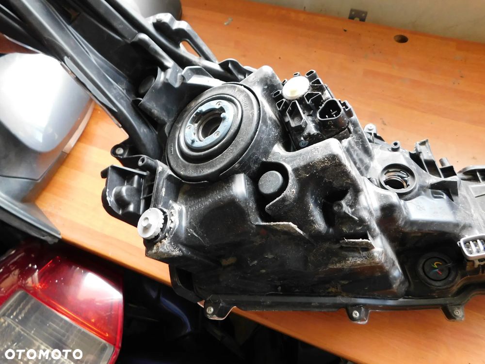 lampa lewa przód TOYOTA COROLLA E21 EU - 11